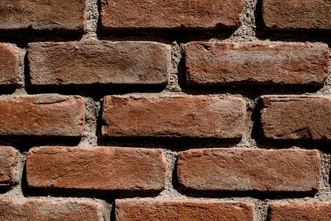 Close-up view of red brick masonry on building facade. 写真素材