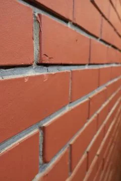 A close-up view of a red brick wall Stock Photos
