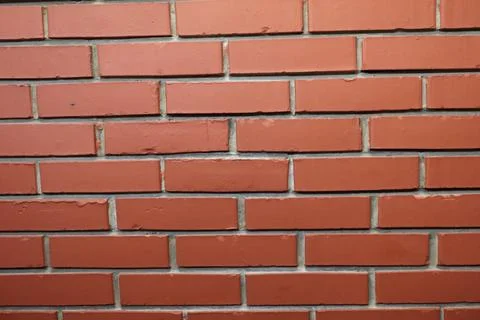 A close-up view of a red brick wall Stock Photos