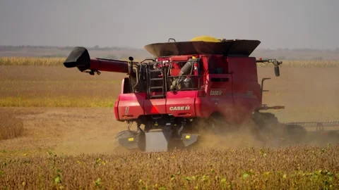 Close view of a red combine harvesting near Lebanon Stock-Footage 345530606