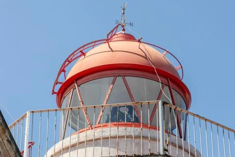 Close up view of red lighthouse lantern dome in El Musel port Gijon Spain 스톡 사진
