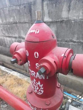 Close Up View of Red Outdoor Fire Hydrant Pillar Stock Photos