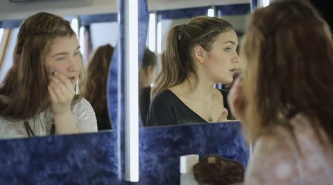 Close up view of reflected woman making up in model school Stock-Footage 67602587