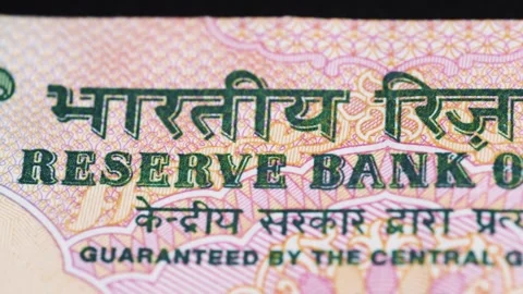 Close up view of Reserve Bank of India text on Indian Rupee bank note. 스톡 동영상 325835563
