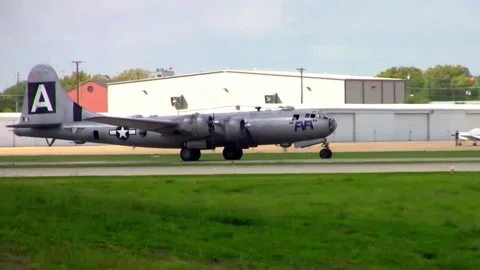 Close view of restored B-29 Superfortress Bomber "Fifi" taxiing toward runway Stock-Footage 147157363
