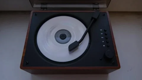 Close up view of retro cd player playing disk with stylus arm. Vintage music Stockbeeldmateriaal 333581295