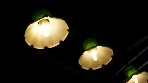 Close-up view of the retro lighting hanging  on the ceiling Видео 126310670