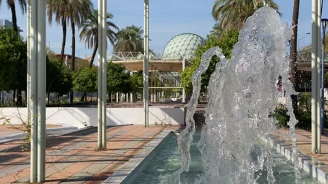 Close view of rhythmic fountain jets in the Seville Expo park, catching bright 스톡 동영상 325359007