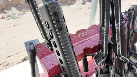 Close up View of Rifles on a Gun Rack at a Shooting Range Stock Footage 318616948