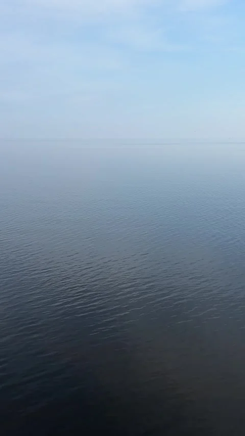Close-up view of rippling dark blue water surface Vídeo Stock 336260220
