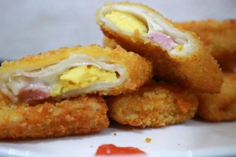 Close up view Rissole Mayonnaise (Risol Mayo) served on a white plate Stock Photos