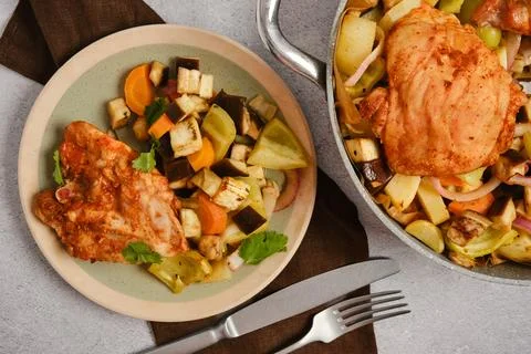 Close up view of roasted chicken and vegetable meal on plate Stock Photos