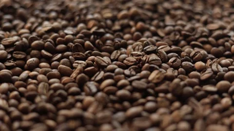 Close-up view of roasted coffee beans with rich textures and colors Stock Footage 338431322