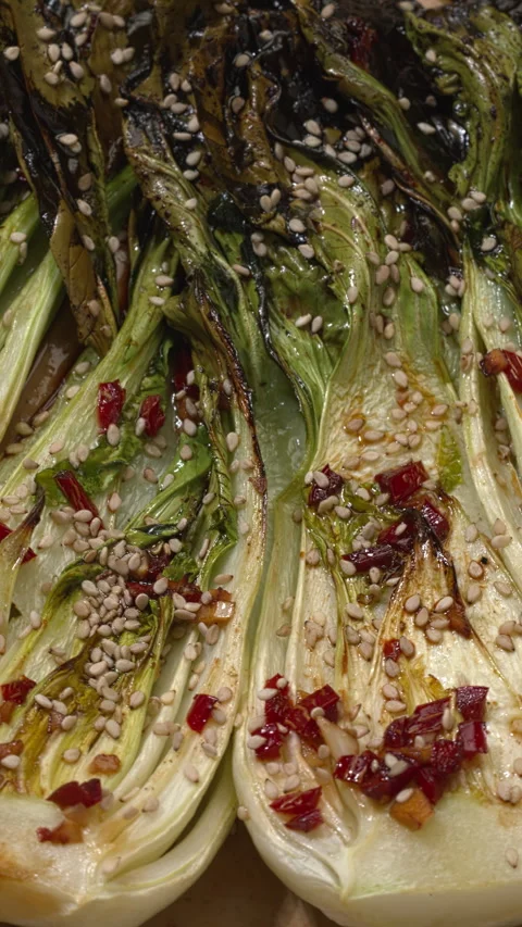 Close-up view of roasted pak choi. Vertical video. Stock Footage 277218790
