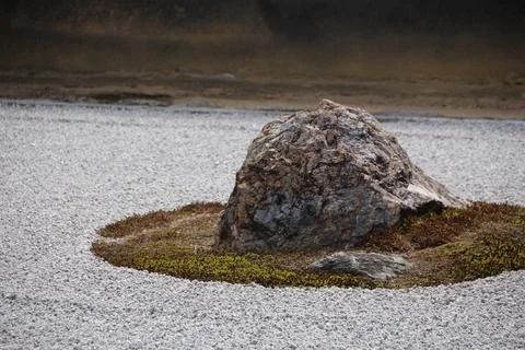 Close view of a rock with diffuse lighting. Ideal to represent the idea of .. Stock Photos