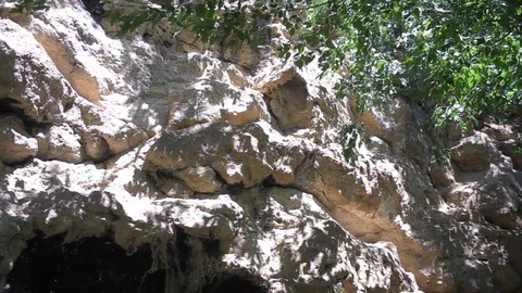 Close up view of rock hill. Shadows moving on a stone rock.Pure nature Stock Footage 99310469