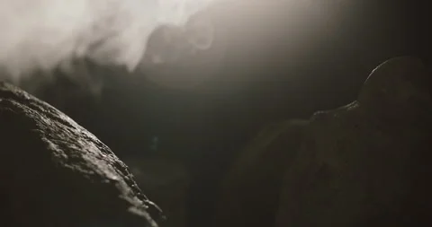 Close up view of rocks in the smoke, mountains at night Stock Footage 153289755