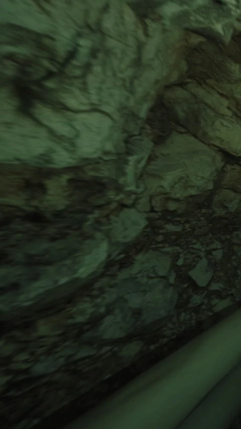 Close view of rocky surface in cave taken in evening light Stock Footage 334310354