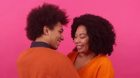 Close-up view of romantic, cheerful couple hugging each other Video stock 230110677
