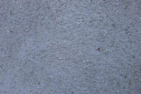 Close up view of a rough grey concrete wall texture Stock Photos