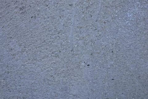 Close up view of a rough grey concrete wall texture Stock Photos