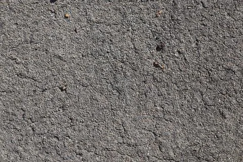 Close up view of a rough grey concrete wall texture Stock Photos