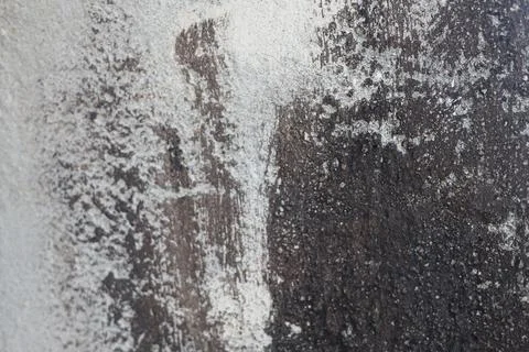 Close up view of a rough grey concrete wall texture Stock Photos
