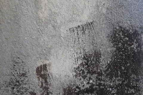 Close up view of a rough grey concrete wall texture Stock Photos
