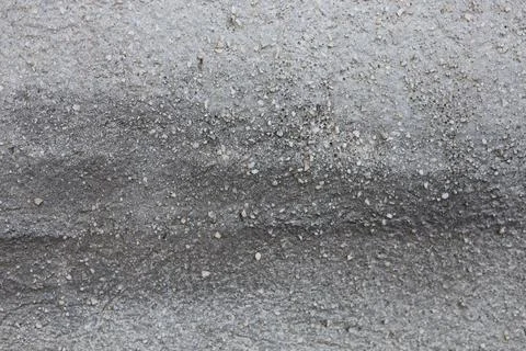 Close up view of a rough grey concrete wall texture Stock Photos