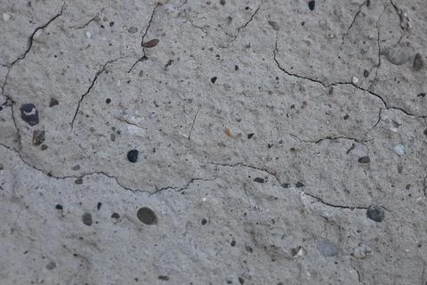 Close up view of a rough grey concrete wall texture Stock Photos