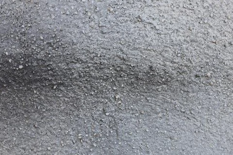 Close up view of a rough grey concrete wall texture Stock Photos