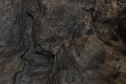 Close-up view of rough, textured dark gray rocks Stock Photos
