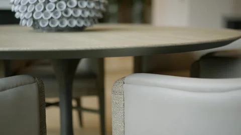 Close up view of round table with decorative centerpiece on top. Table is Video stock 297751447