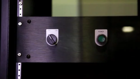 Close up view on row of digital on off start power emergency stop button knob on Stock Footage 138773943