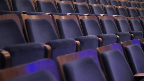 Close up view on rows of empty seats in auditorium Stock Footage