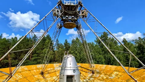 Close-up view of the RT-32 radio telescope's structural elements against a Stock Footage 282698554
