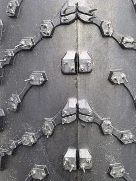 Close-up view of a rugged tire tread with intricate patterns and details Stock Photos