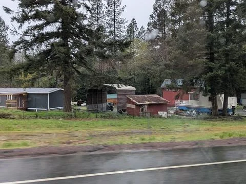 Close-up view of run-down buildings and a boat Stock Photos
