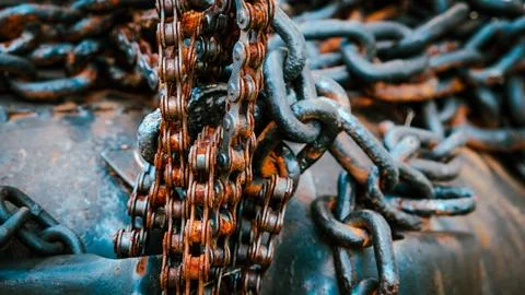Close view of rusted  chains and industrial equipment Stock Photos