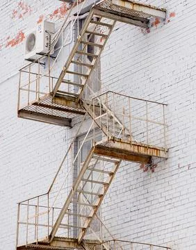 Close View Of Rusted Fire Escape Stairs 库存照片