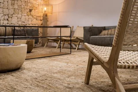 Close-up view of a rustic design chair in an empty hotel room waiting for tou Stock Photos