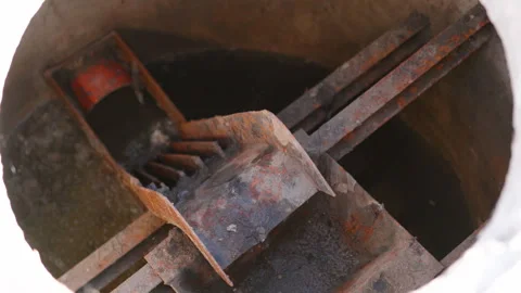Close-up view of rusty sewerage system components, showcasing the intricate Stock Footage 319534704