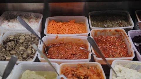 Close up view of salads made with cabbage and carrot and different vegetables Stock Footage 181649276