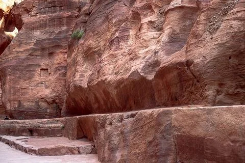 Close-up view of the sandstone rocks during the day in the Siq Gorge, Petra Stock Photos