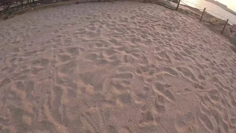 Close-up view of sandy beach ground camera moving toward beach Stock Footage 295091803