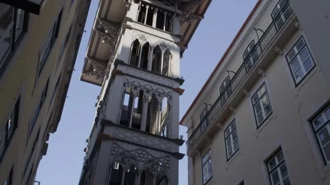 Close View of Santa Justa Lift Tower in Lisbon Portugal During Summer Golden Stock Footage 341997111