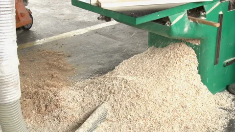 Close up view of sawdust falling Stock Footage 148302551