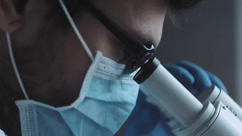 Close up view of scientist eye Stock Footage 70851708