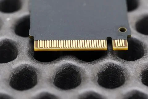 Close view of SDD component on black surface with patterns Stock Photos
