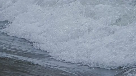 Close up view of sea wave with foam on coast in Catalonia Stock Footage 143104025